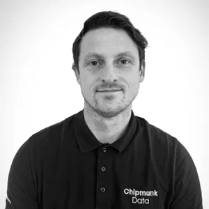 Comp Cloud – About Us4 Professional headshot of man wearing Chipmunk Data branded polo shirt
