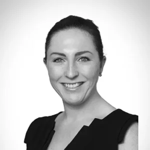 Comp Cloud – About Us9 Professional black and white headshot portrait of smiling woman